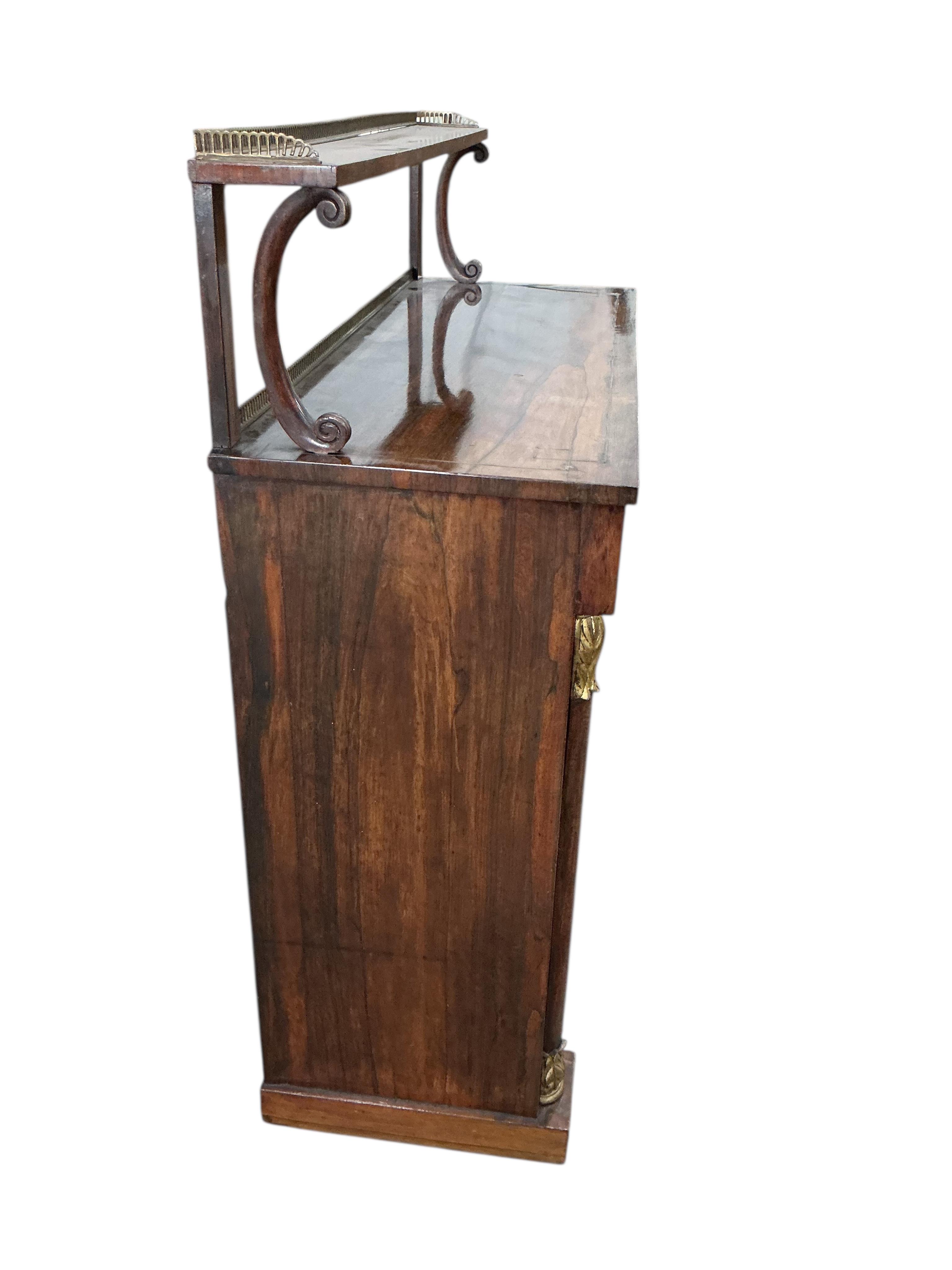 A Regency brass strung rosewood chiffonier, width 106cm, depth 39cm, height 117cm